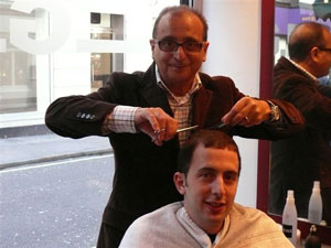 Daniel in action doing scissors over comb